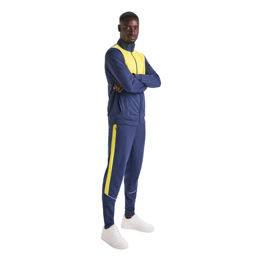 Person wearing a blue tracksuit with yellow accents on a white background