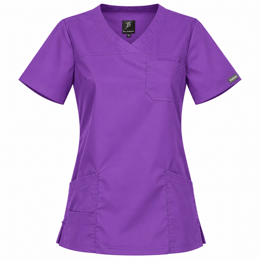 A women's purple scrub top with short sleeves, a V-neckline, a chest pocket, and two front patch pockets, shown on a plain white background.